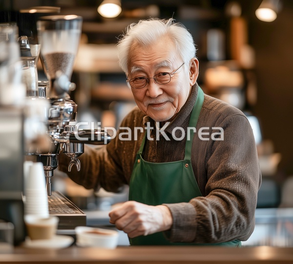 카페에서 커피를 내리고 있는 바리스타 노인